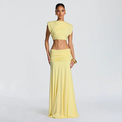 Matching pleated co-ord set styled as an elevated occasion outfit