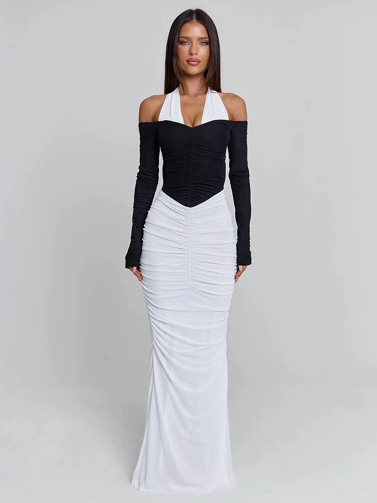 Off-shoulder long sleeve styling on a halter neck patchwork maxi dress