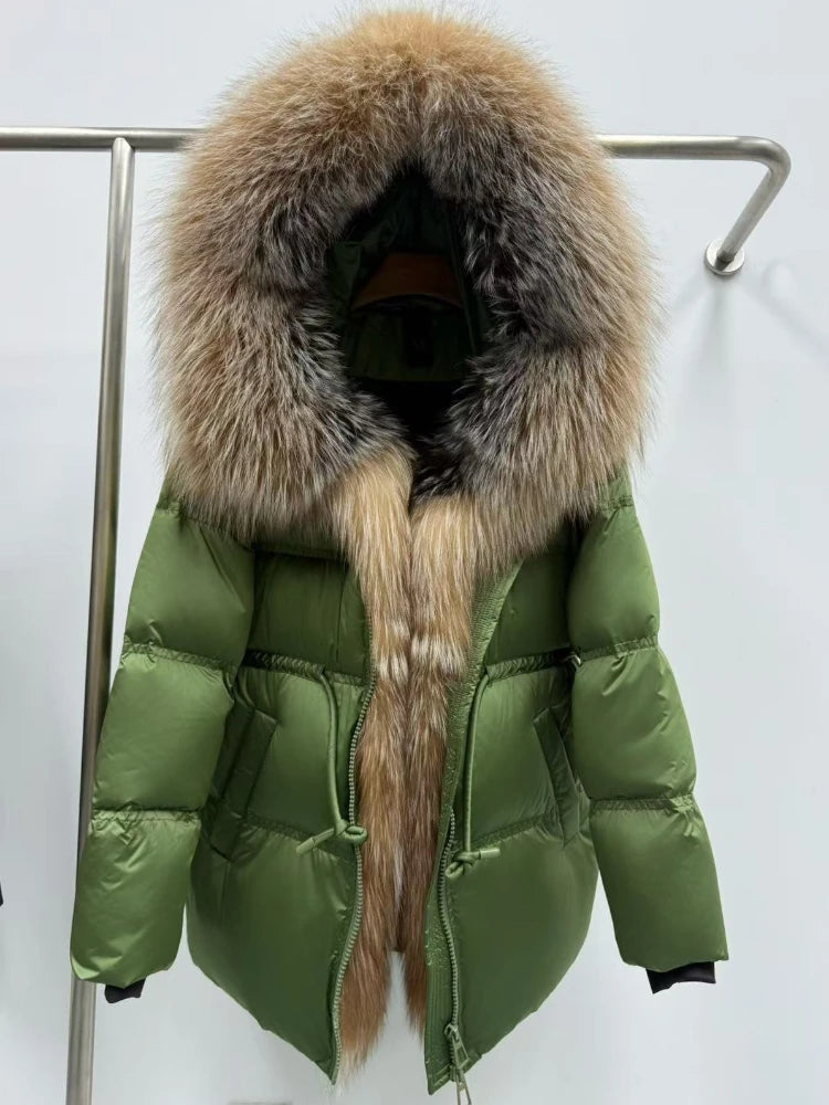 Olive hooded down puffer jacket hanging on a rack, framed by an oversized natural fur trim that drapes down the front.