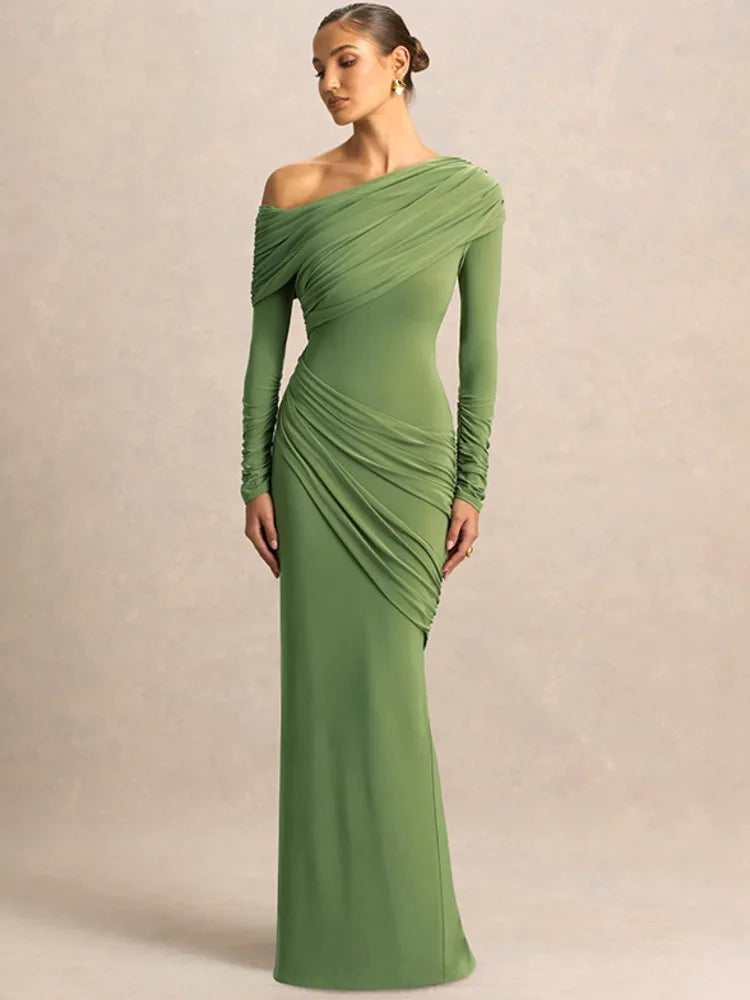 Full-length view of green ruched evening gown with long sleeve