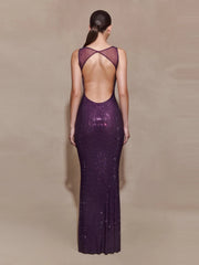 Open-back purple evening dress showcasing strap detailing