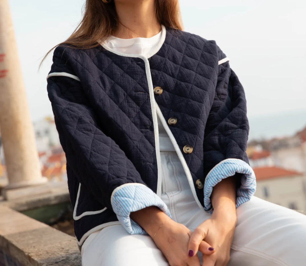 The full length of the short coat, showing its regular and comfortable fit.

