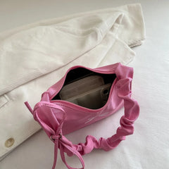 Lightweight feminine pink tote with embroidered bow

