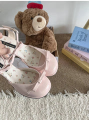 Elegant pastel pink slingback sandals with bow