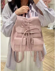 Pastel pink drawstring backpack with bow detail