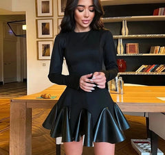 Knitted patchwork dress styled with over-the-knee boots