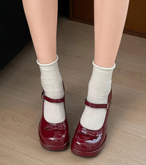 Patent leather Mary Jane shoes styled for spring fashion
