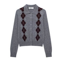 Close-up of diamond-pattern knit with slim buttoned shaping