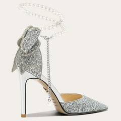 “Elegant slip-on heels styled with satin skirt for evening event”

