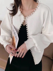 Women’s round neck sweater with pearl trim