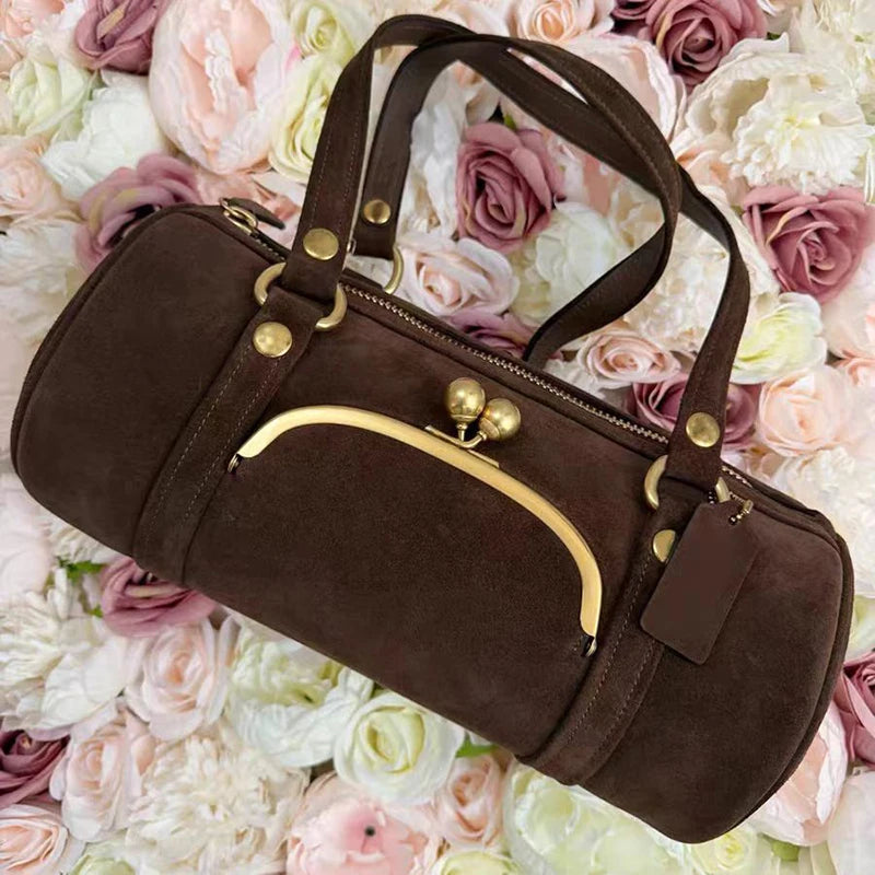 Brown Boston handbag with smooth lining and interior zipper pocket