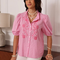 Pink embroidered blouse styled for summer brunch and travel