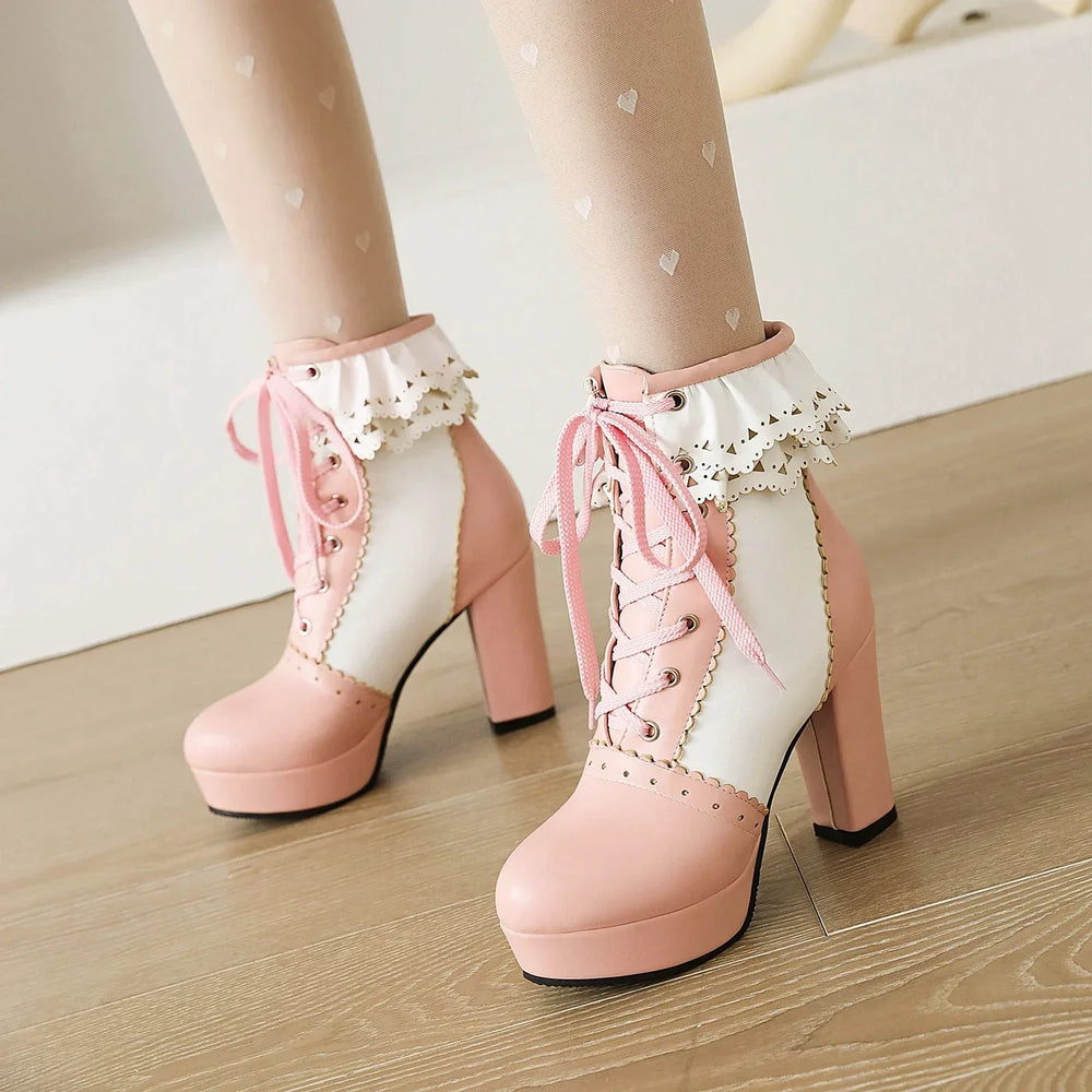 Pink ankle boots with ruffled collar and lace-up front