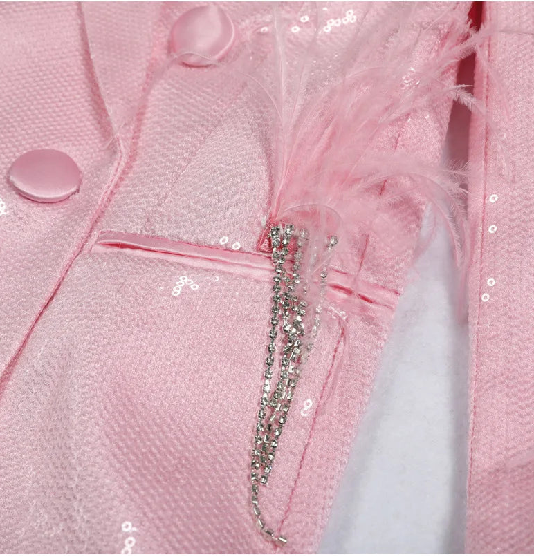 Pink sequin blazer displayed flat to showcase overall silhouette, length, and refined construction details.