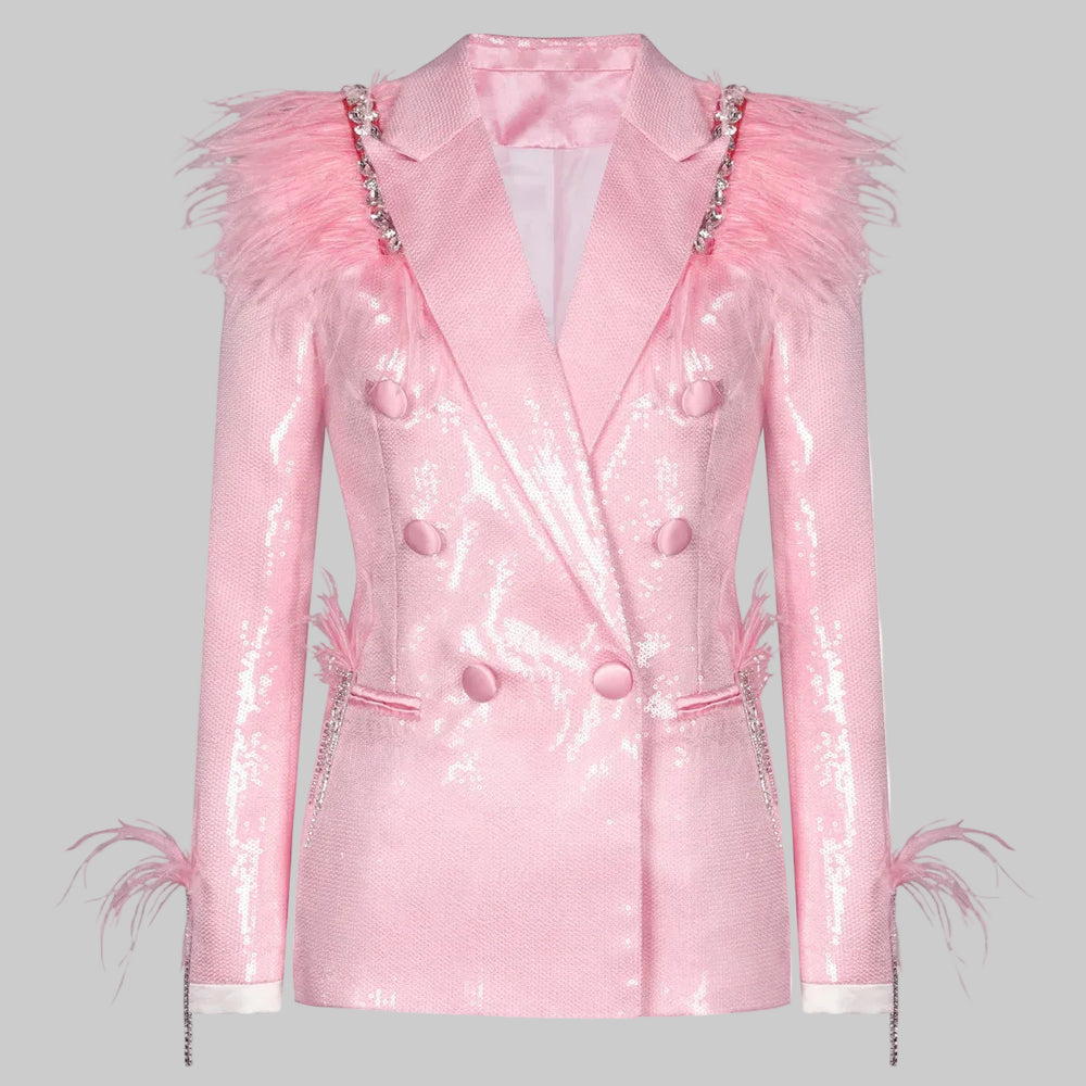Front view of a pink sequin blazer with feathered shoulders, shown in a clean studio setting highlighting its tailored shape.