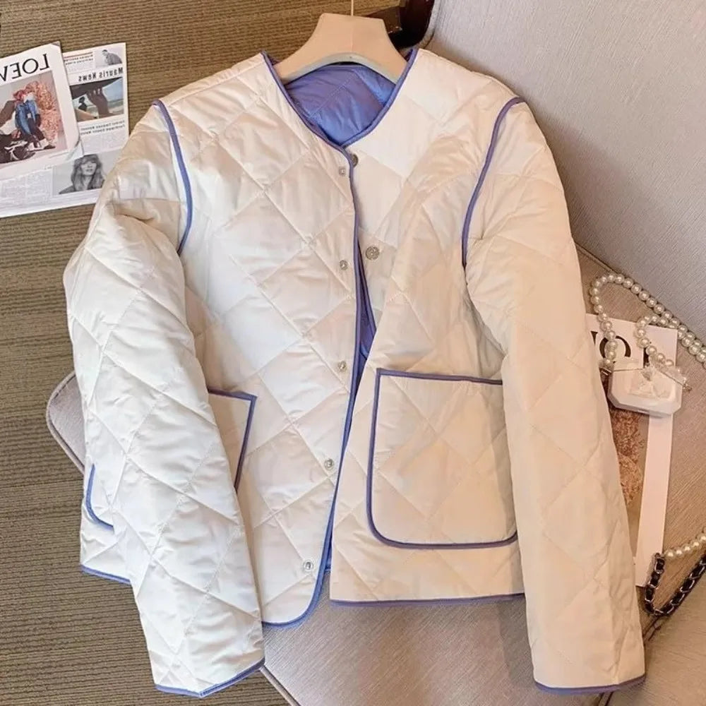 A close-up of the elegant plaid panel and the sleek collar.