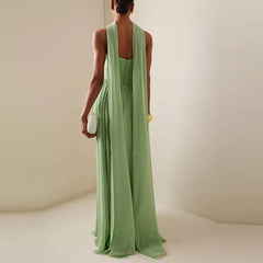 Pleated green evening gown ideal for weddings and galas
