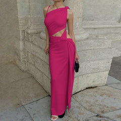 An elegant sheath party gown styled with heels and a clutch.