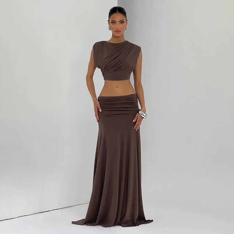 Front view of a pleated crop top and ankle-length skirt matching set