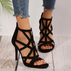 Front view of women’s pointed toe cross strap stiletto sandals