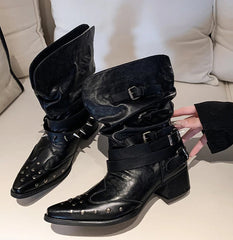Black mid-calf riding boots with pleated shaft and rivets
