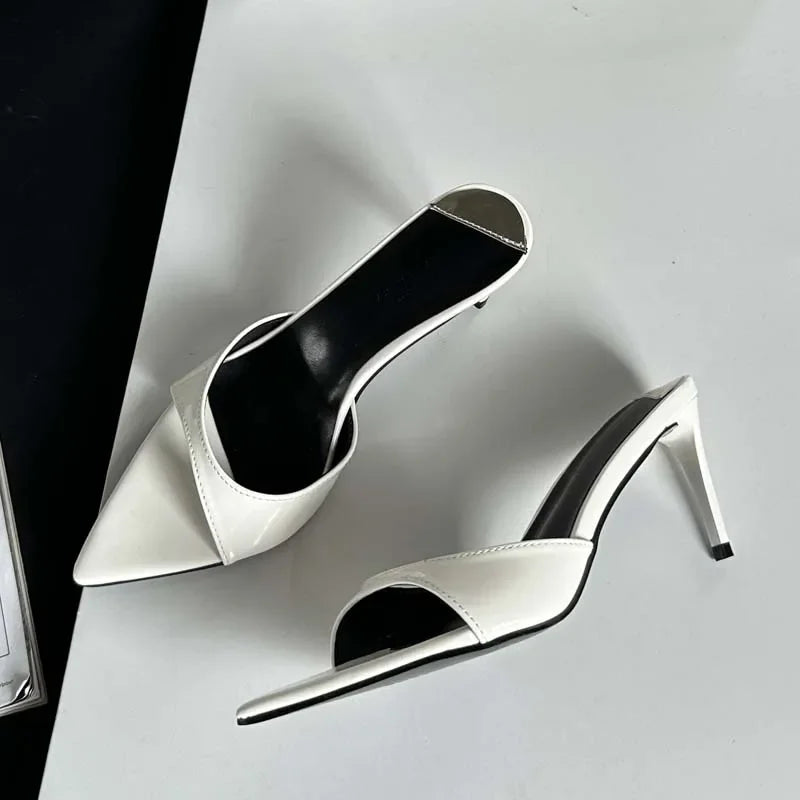 White pointed toe mule slides with slim high heel