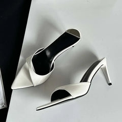 White pointed toe mule slides with slim high heel