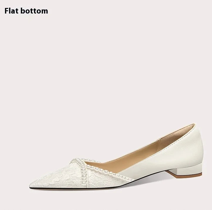 Side view of lace pearl high heel wedding shoes