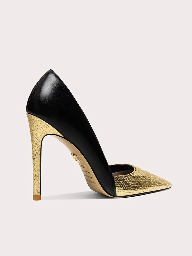 A close-up of the pointed toe shape and heel detail on the shoe.