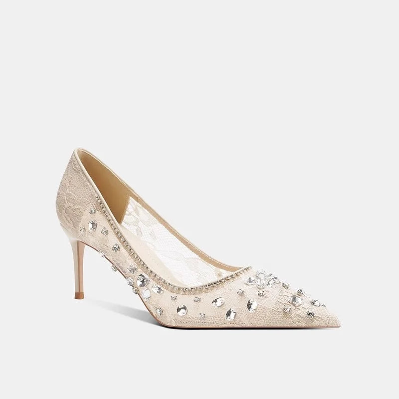 Pointed toe stiletto heels in beige mesh with crystal embellishments