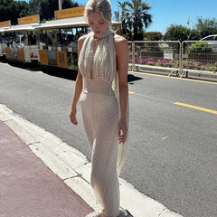 Polka dot maxi dress styled for summer evening parties