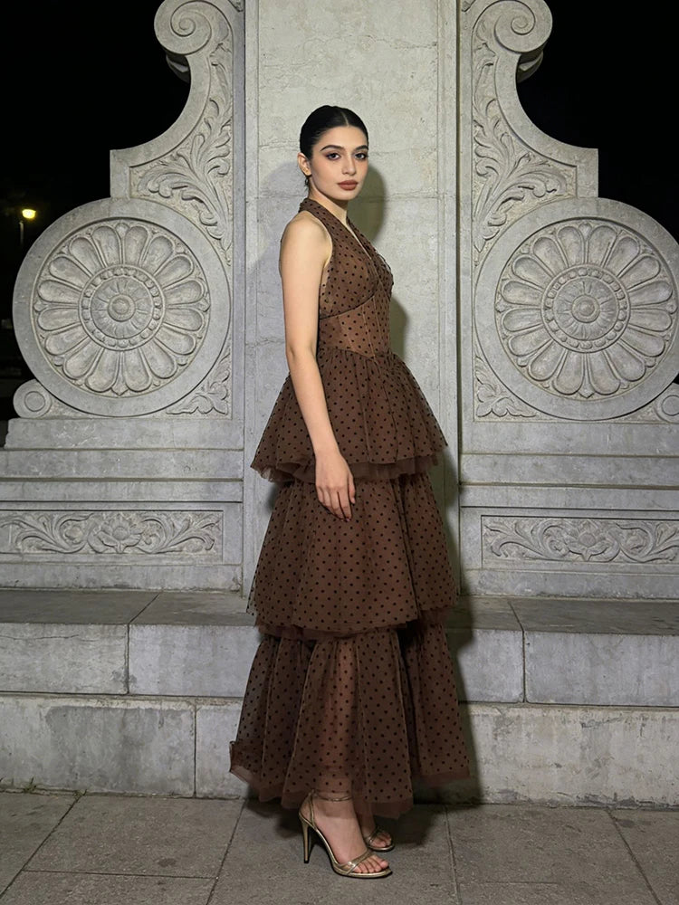 Sleeveless halter dress with layered A-line silhouette and sheer texture