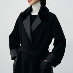 Structured black coat with leather patchwork