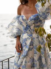 A close-up of the puff sleeve detail on the dress.