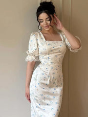 Floral puff sleeve dress styled with neutral accessories for brunch setting