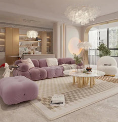 “Plush flannel floor couch styled with gold table and soft lighting”
