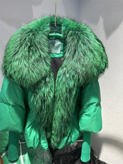 Wide-waisted short winter jacket in emerald with real fur detail