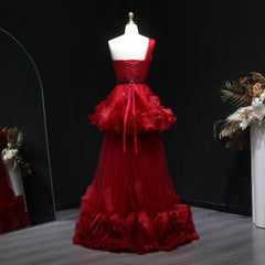 Close-up of the dimensional floral accents on the bodice and skirt