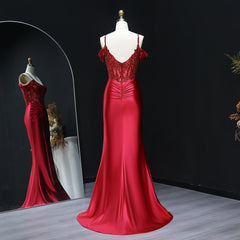 Close-up of beading and sequins on satin bodice of mermaid gown