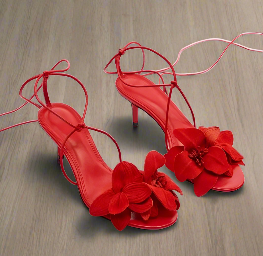 Red lace-up stiletto heels with 3D flower details