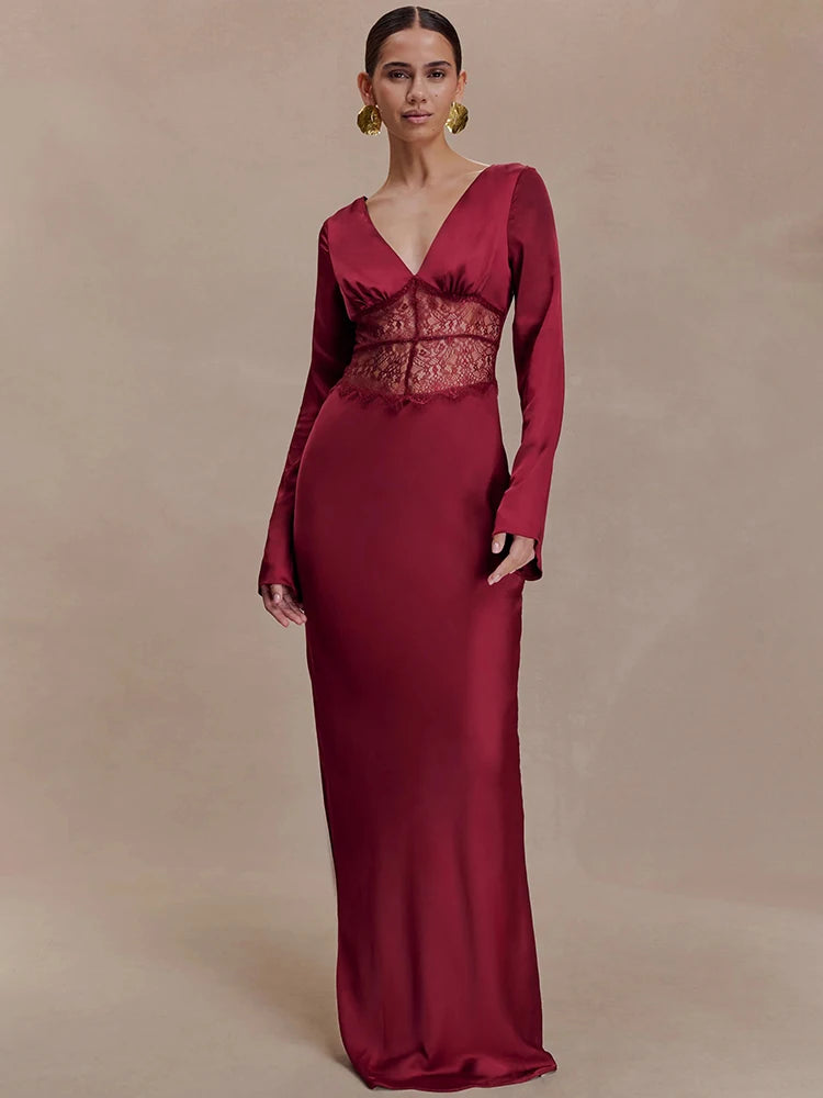 Full-length view highlights the lace patchwork waist detail and clean floor-length skirt, creating an elongated silhouette with refined coverage.