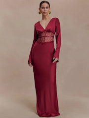 Full-length view highlights the lace patchwork waist detail and clean floor-length skirt, creating an elongated silhouette with refined coverage.