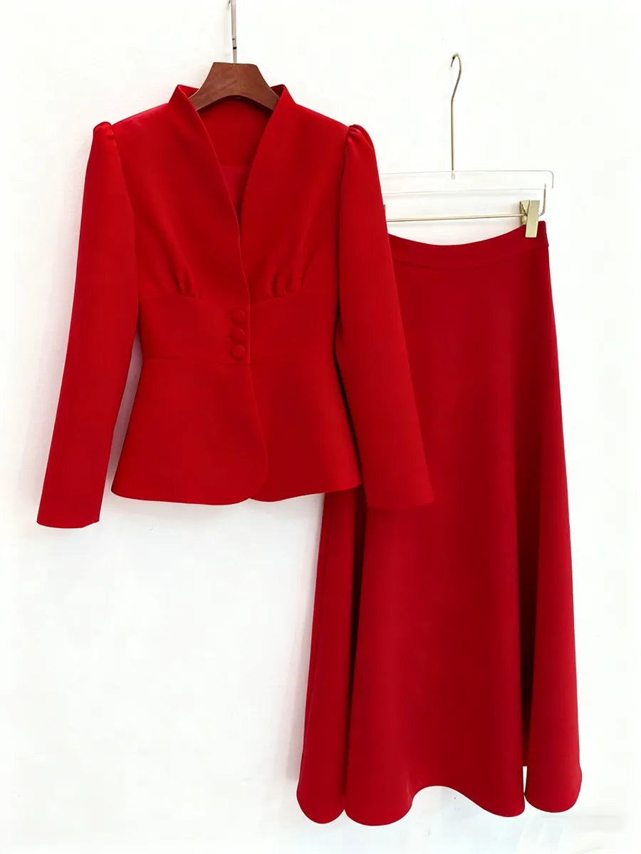 Long-sleeve tailored jacket with matching ankle-grazing skirt styled with pointed heels