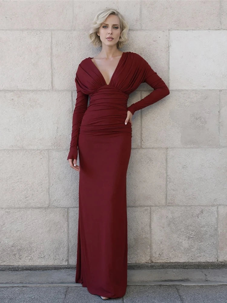 red ruched long sleeve maxi gown for formal events