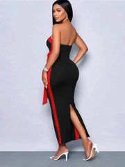 Red sash black jersey cocktail dress with elegant statement bow