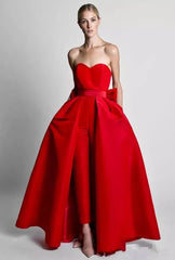 Red satin jumpsuit with detachable A-line skirt and bow
