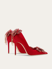Red silk bow crystal heels with butterfly-knot back and jeweled toe