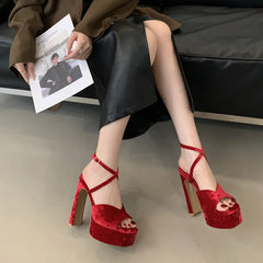Red velvet platform wedges with buckle strap detail