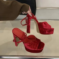 Red velvet platform wedges with buckle strap detail