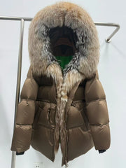 Front-on view shows the regular-length padded body, relaxed proportions, and clean panel lines with the hood standing tall.